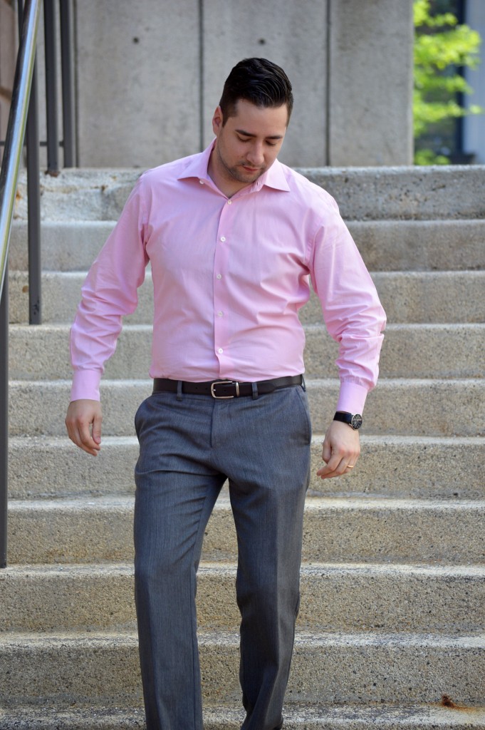 men in pink shirts + gray pants