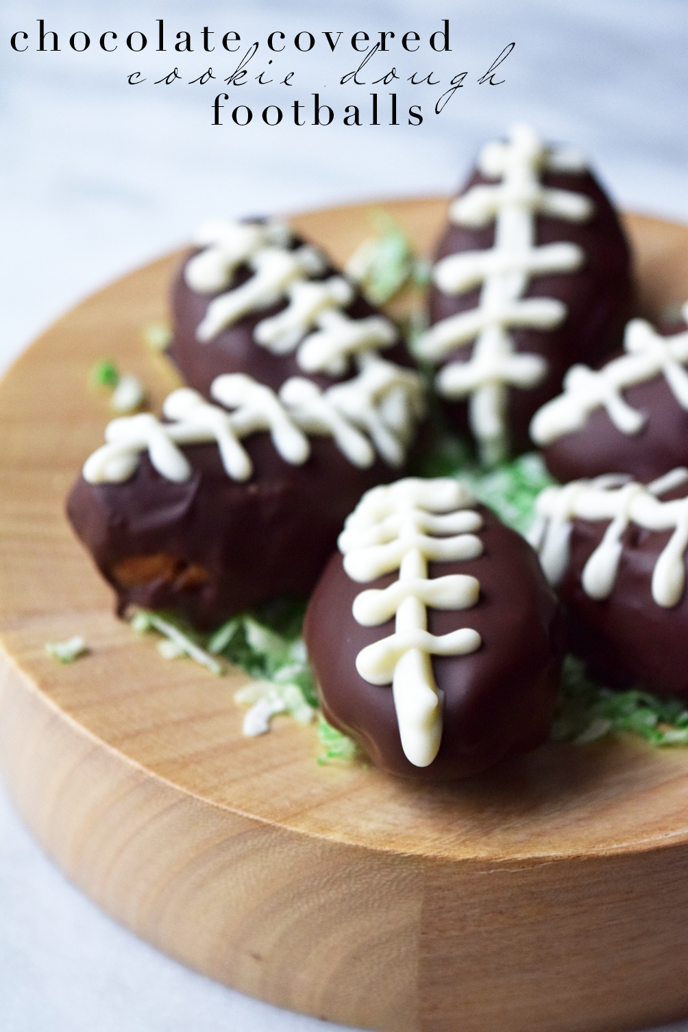 chocolate covered cookie dough footballs - Super Bowl food ideas