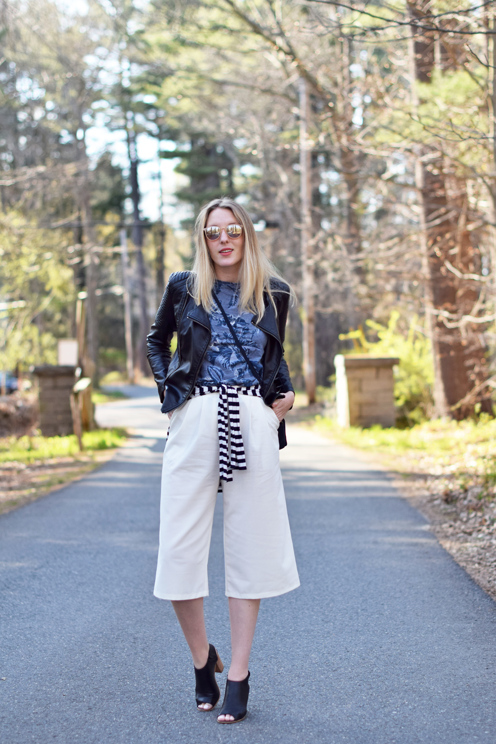 white spring culottes with a leather moto jacket and printed tee - one brass fox