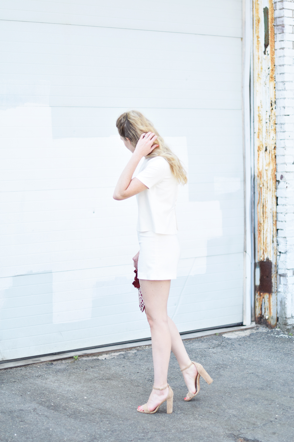 Leslie Musser of one brass fox shares summer style inspiration with a button back white romper