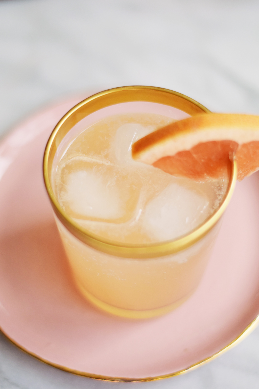 Leslie Musser of one brass fox mixes up the perfect summer drink with this sparkling grapefruit cocktail