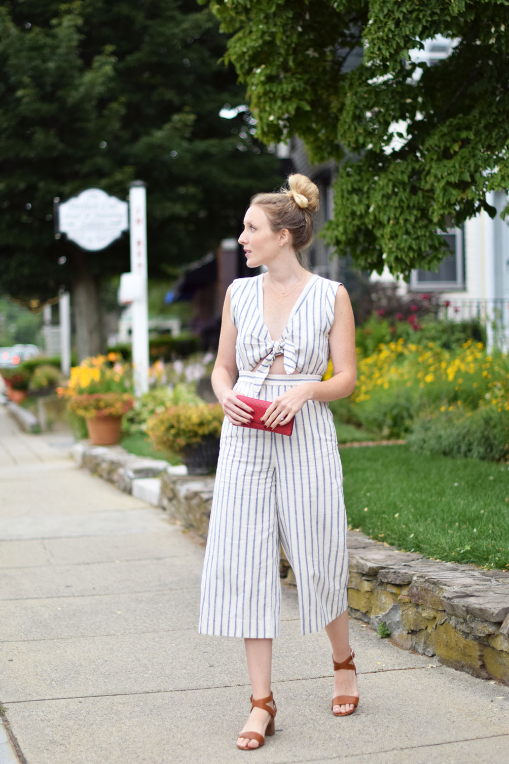 Madewell ikat stripe jumpsuit with leather sandals and a top knot from Leslie Musser, one brass fox