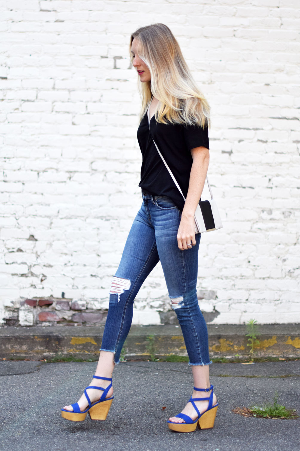 leather platform sandals with raw edge denim and an oversized tee from Leslie Musser of one brass fox