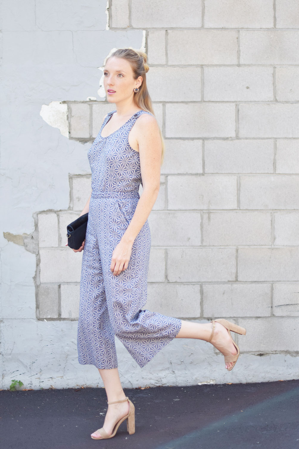 anthropologie tie back jumpsuit with calf hair bag and block heel sandals on fashion blogger Leslie Musser, one brass fox