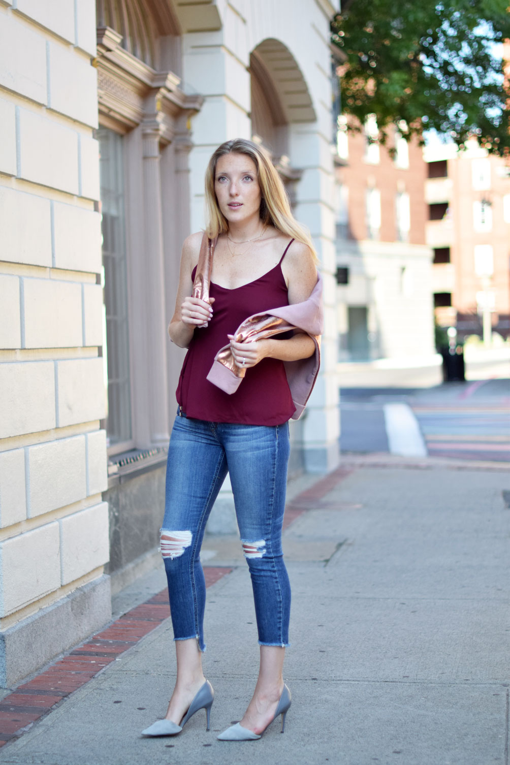 casual summer style with @Nordstrom wearing a wrap front blouse, destroyed skinny jeans, and metallic brushed sweatshirt from fashion blogger Leslie Musser, one brass fox