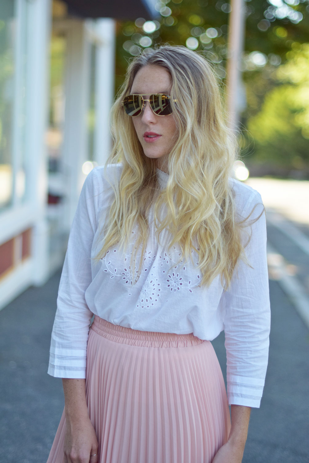 feminine fall style from Leslie Musser of one brass fox with an eyelet victorian top and pink pleated midi skirt