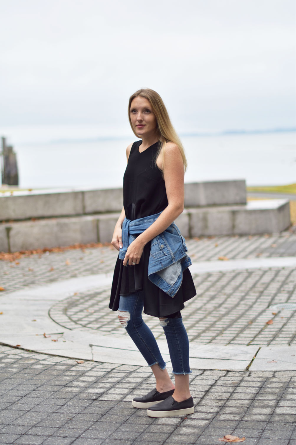 early fall style inspiration from fashion blogger Leslie Musser of one brass fox with distressed layered denim and a swing dress
