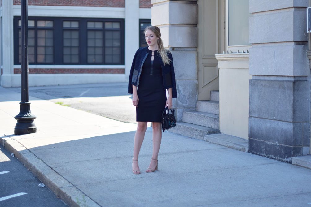 Leslie Musser wears a tweed jacket with this leather black dress and block heel sandals on one brass fox
