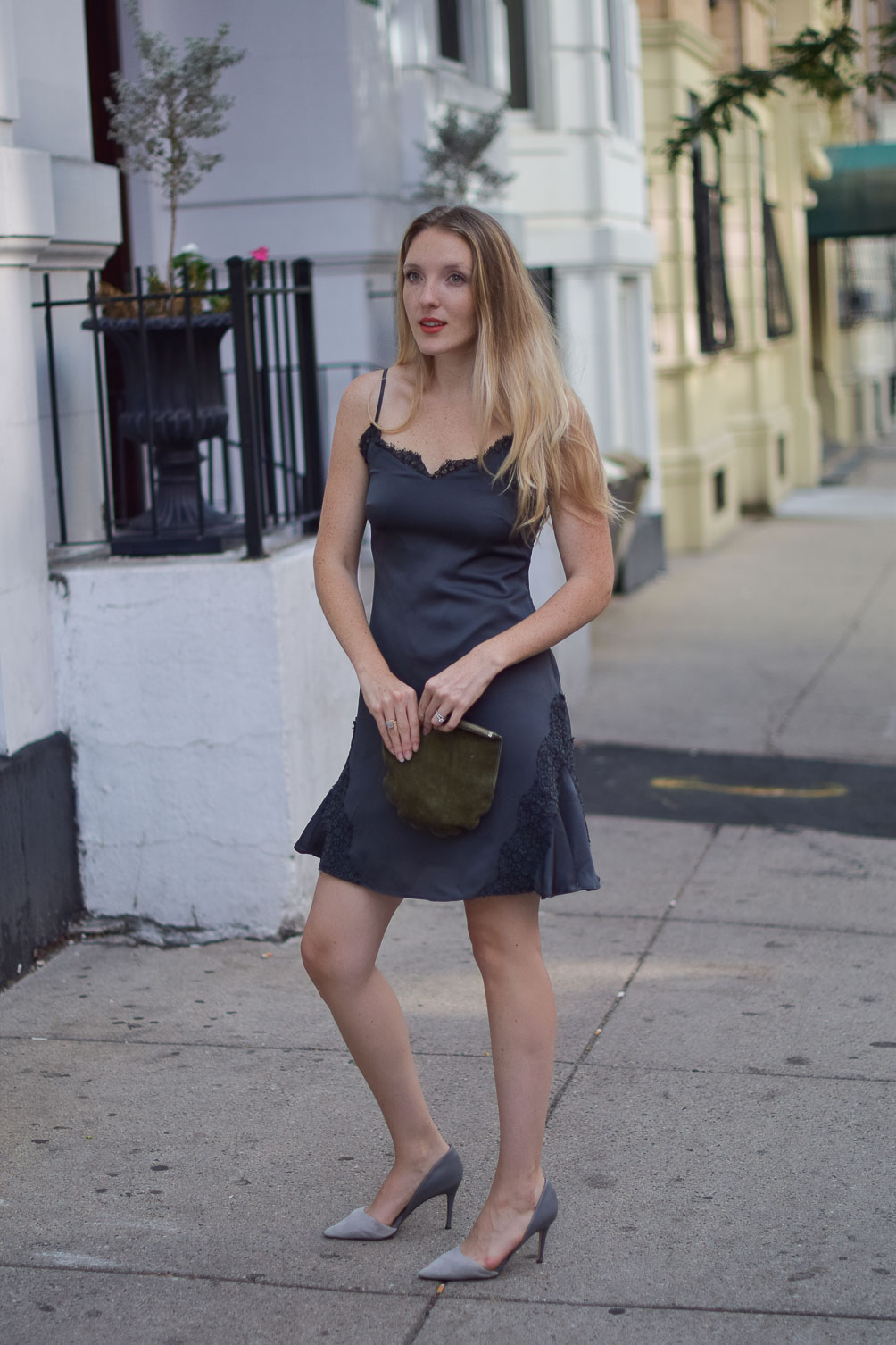 fall style inspo with a lace slip dress, suede heels, and a maroon lipstick on Leslie Musser of one brass fox