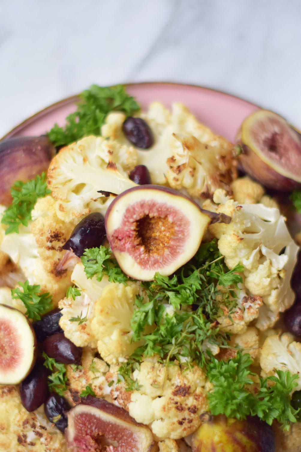 sweet and savory fall recipe for roasted cauliflower with fig + olive from lifestyle blogger Leslie Musser, one brass fox