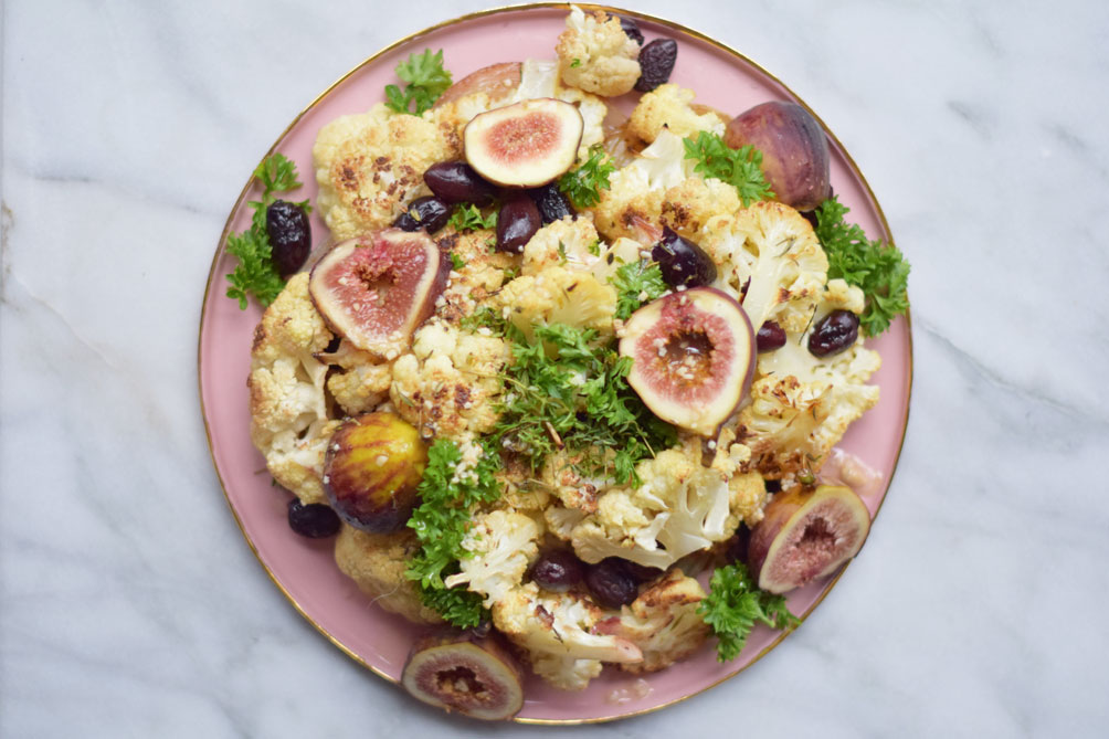 sweet and savory fall recipe for roasted cauliflower with fig + olive from lifestyle blogger Leslie Musser, one brass fox
