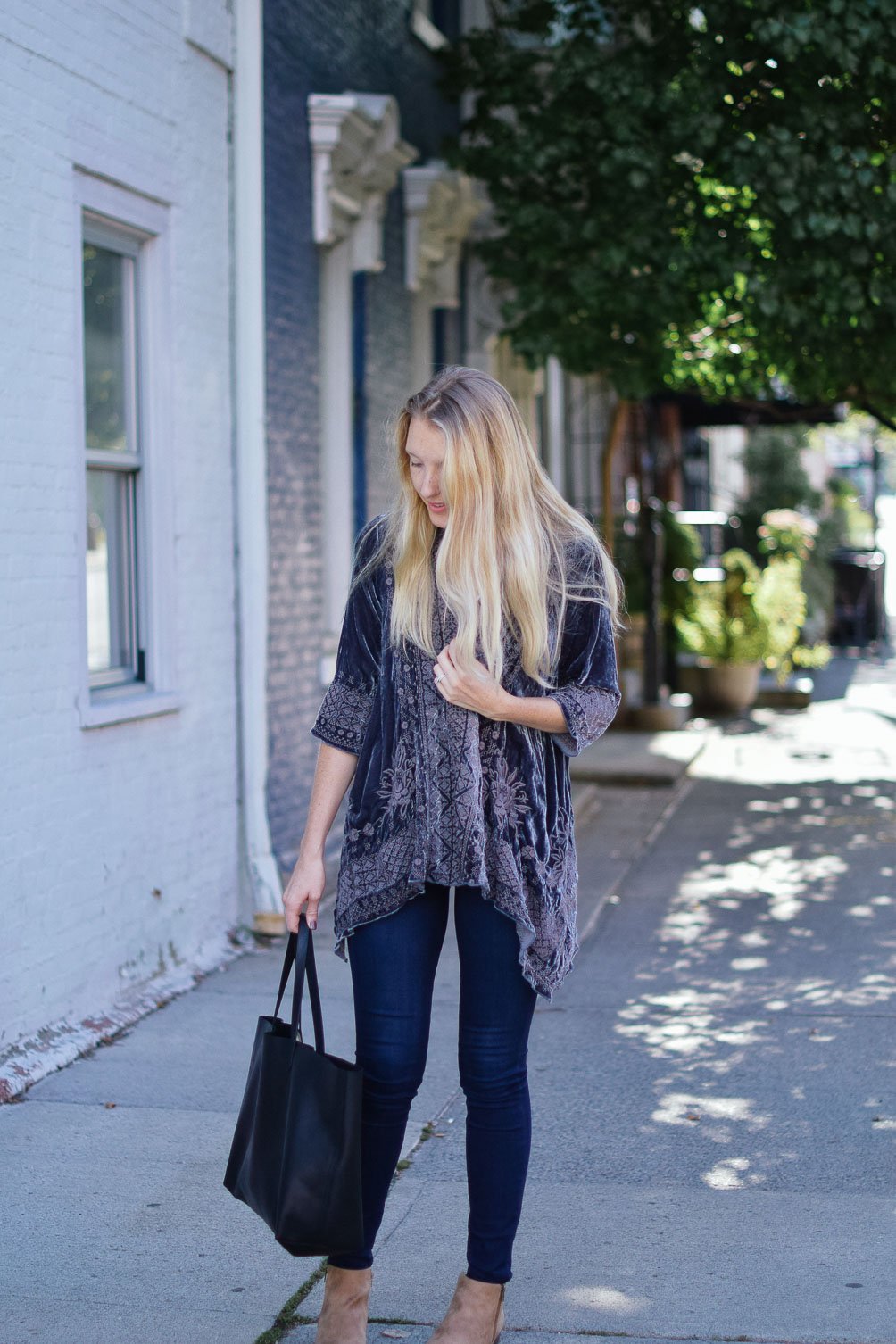 Leslie Musser embroidered velvet jacket and dark skinny jeans with ankle boots fall outfit inspiration on one brass fox