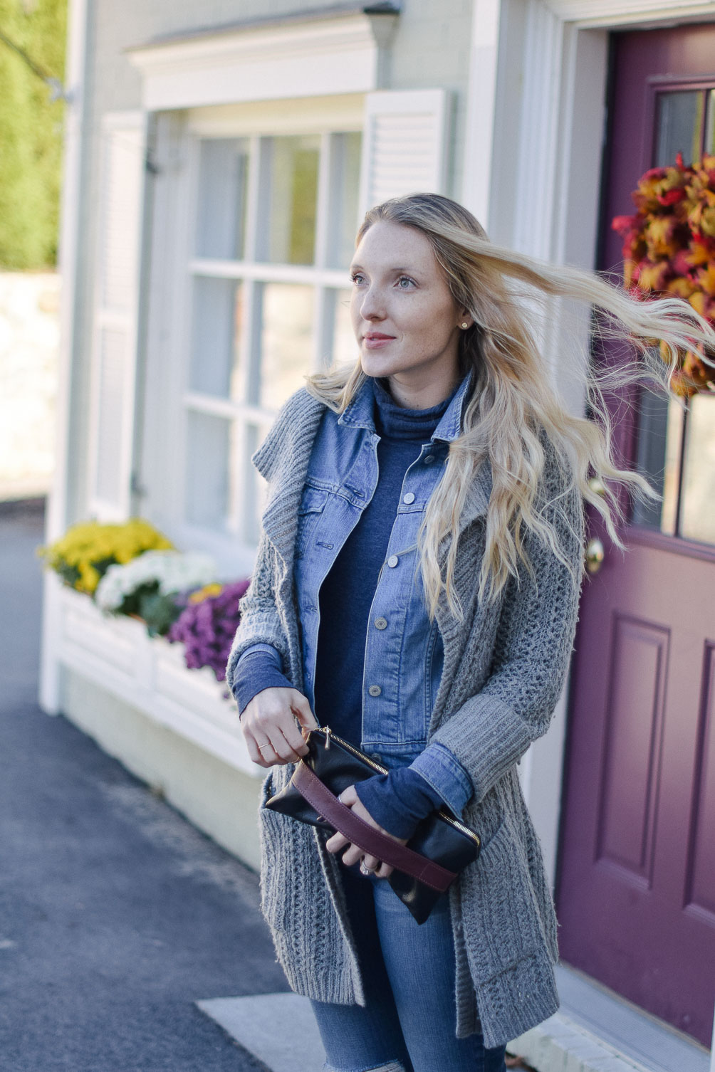 open knit cardigan over a denim jacket One Brass Fox