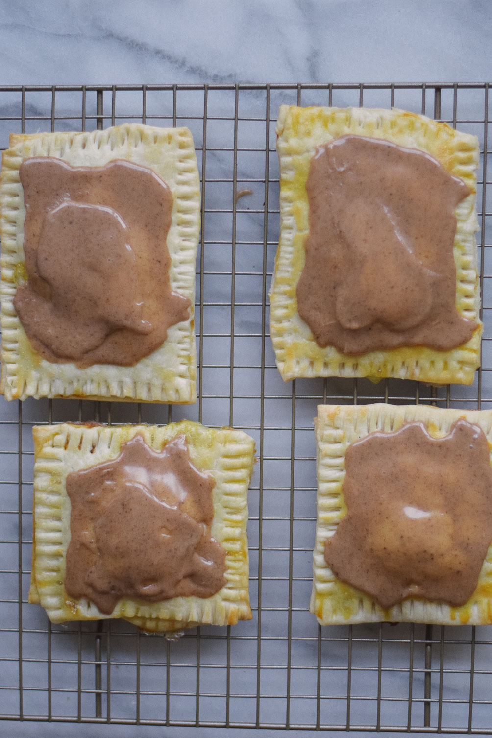 easy and delicious fall recipe for pumpkin brown sugar pop tarts on one brass fox