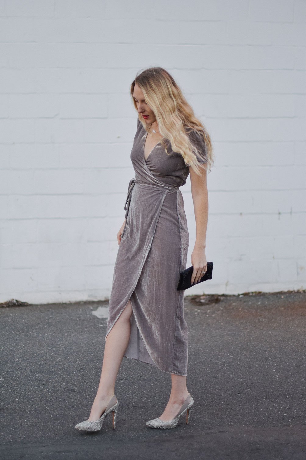 styling a metallic holiday dress party outfit with snakeskin heels and beaded clutch