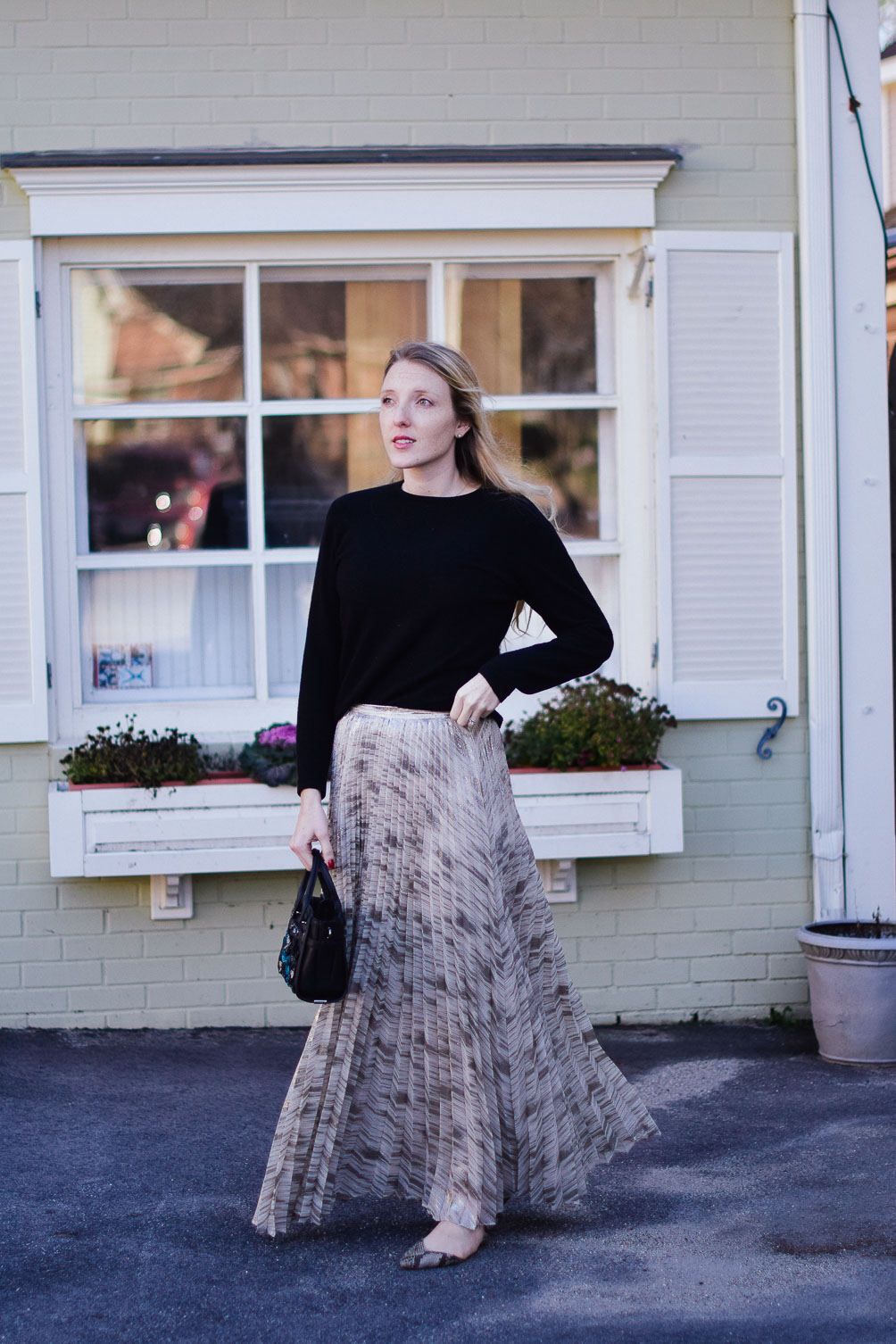 styling a metallic maxi skirt with snakeskin flats and cozy cashmere sweater