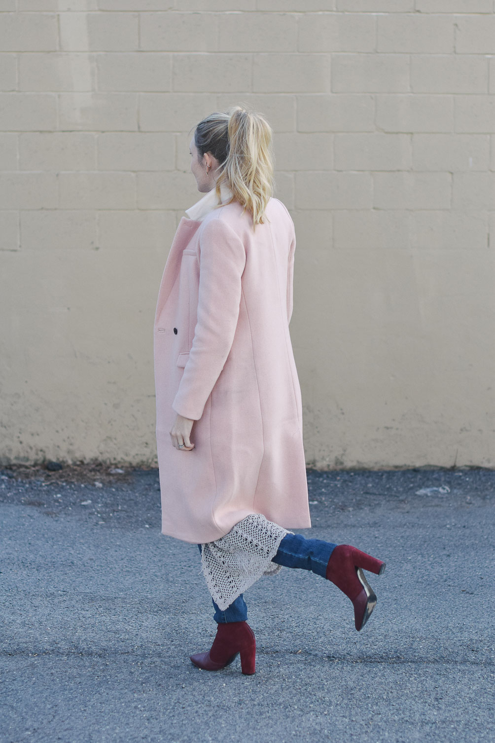 styling pink ombre layers for winter with a duster sweater, maternity jeans, and burgundy boots