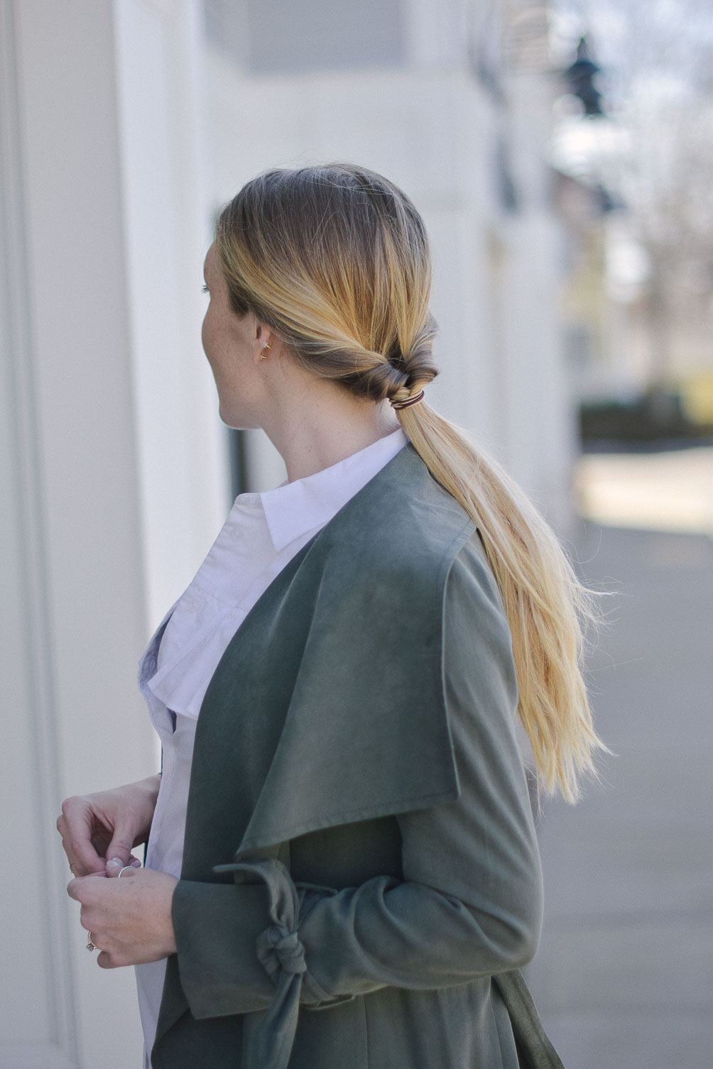 styling a layered spring outfit with olive trench coat, cropped pants, and peep toe mules