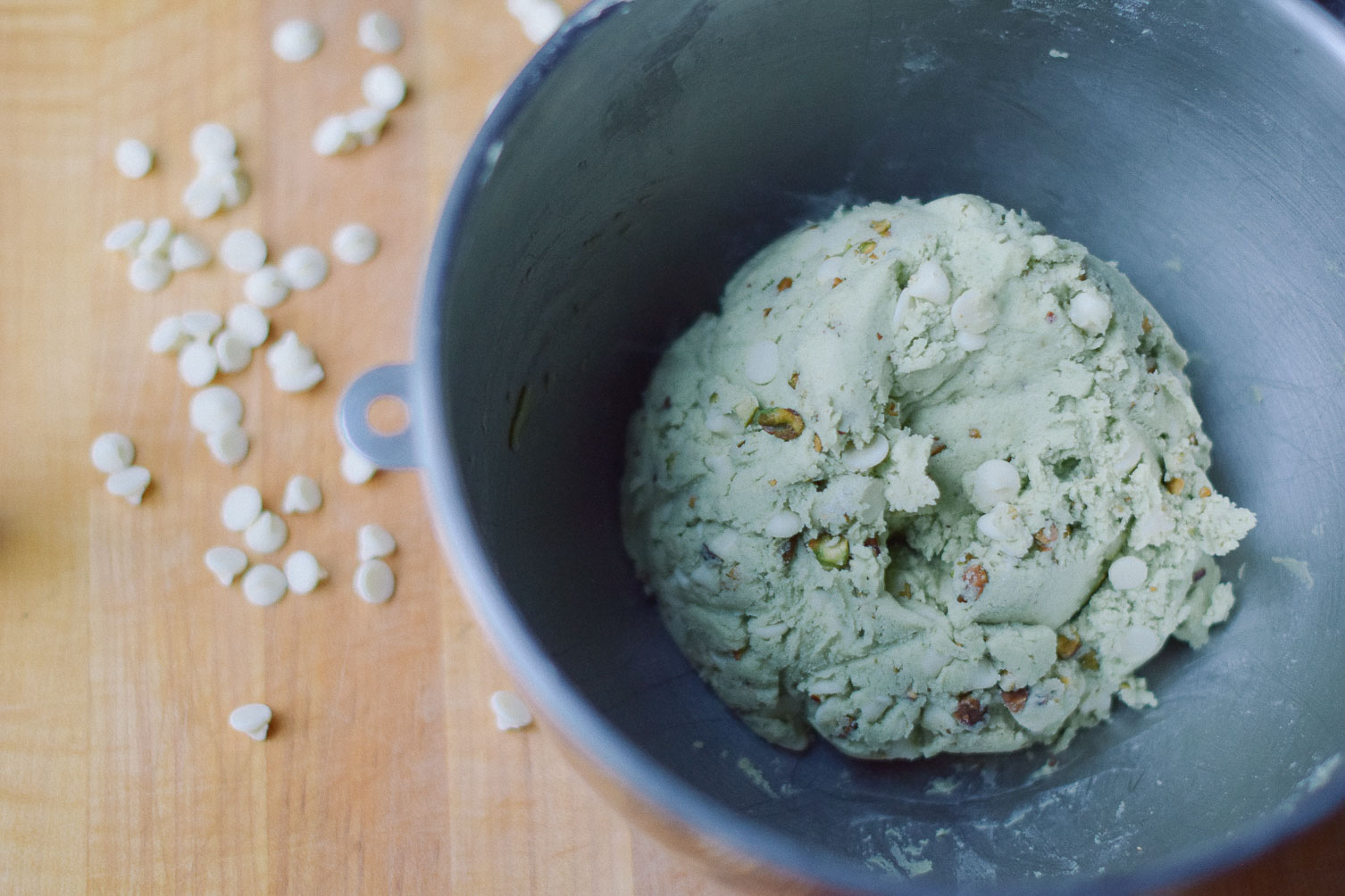 baking a delicious sweet recipe of pistachio cookies for st patrick's day