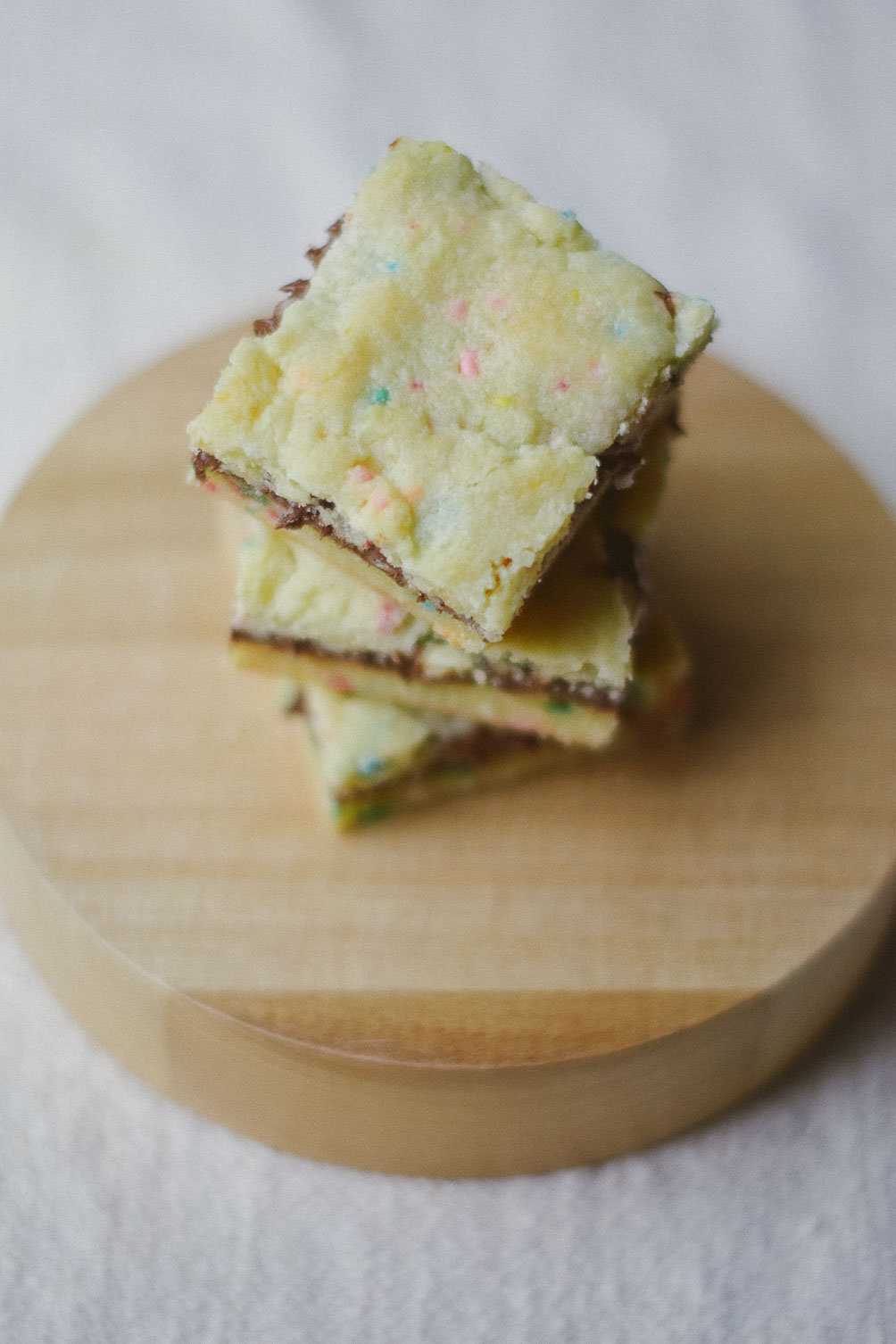cooking up an easy spring dessert recipe for nutella crumble funfetti cake bars