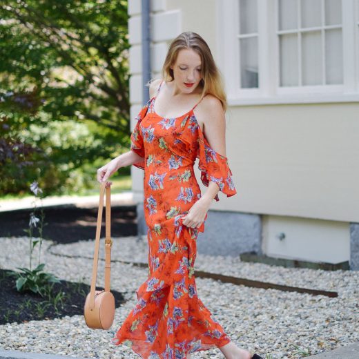 Leslie Musser styling an orange frill maxi dress with circle crossbody and suede mules on one brass fox