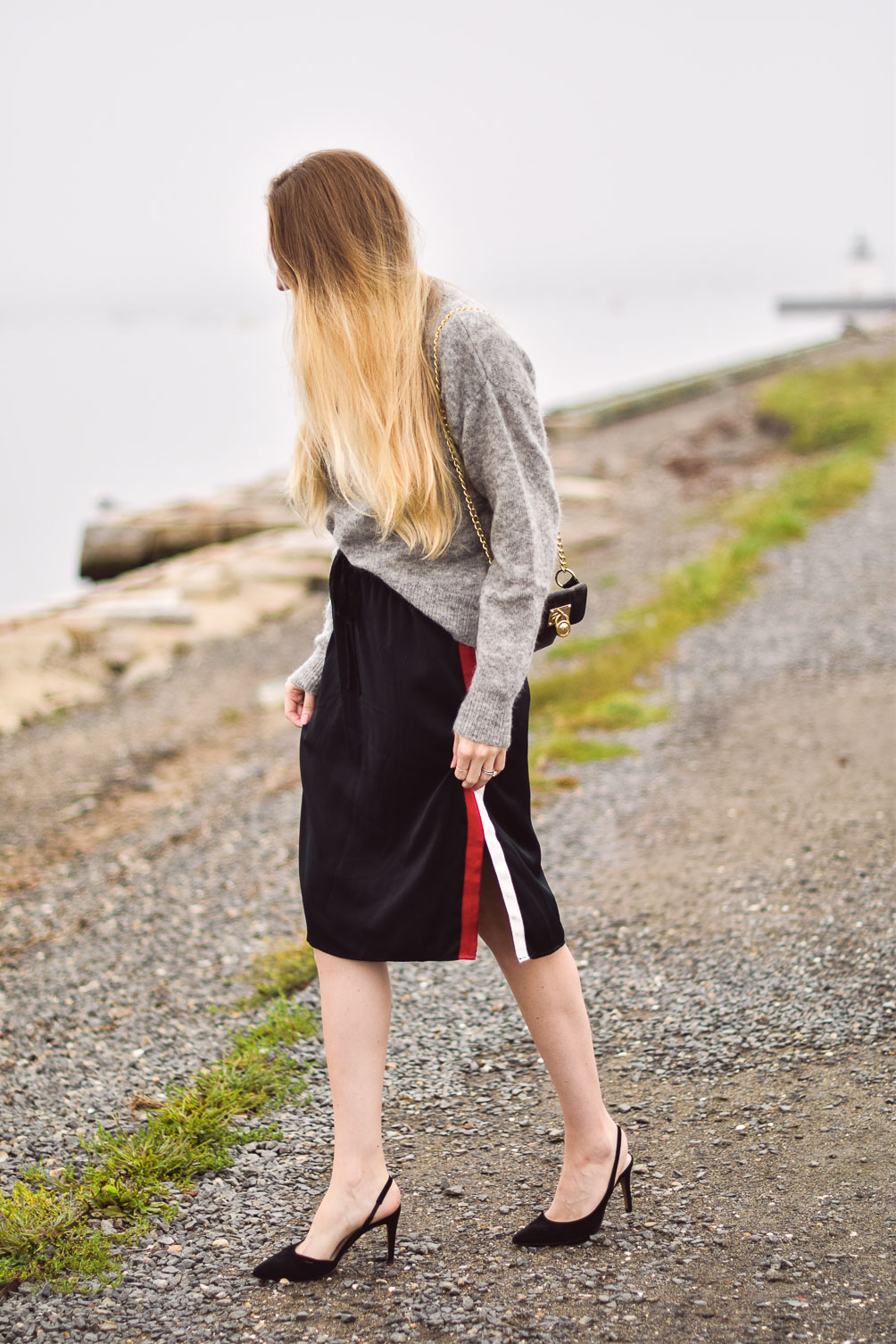 styling a mohair sweater with silky track skirt and black slingback pumps for fall outfit inspiration
