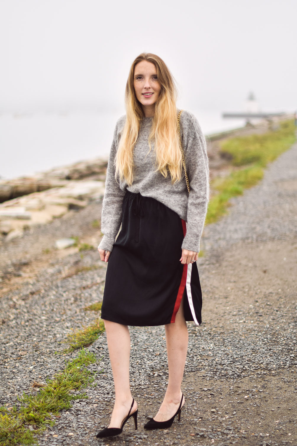 styling a mohair sweater with silky track skirt and black slingback pumps for fall outfit inspiration