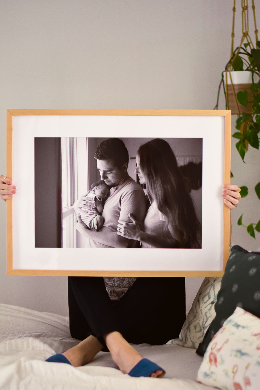 sharing how we used the custom design Framebridge services to display our newborn photos on one brass fox