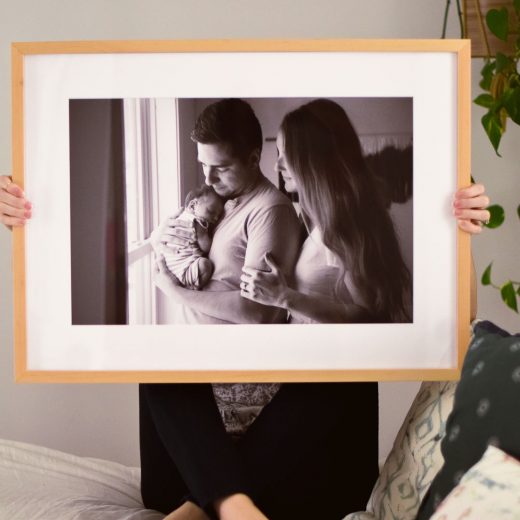 sharing how we used the custom design Framebridge services to display our newborn photos on one brass fox