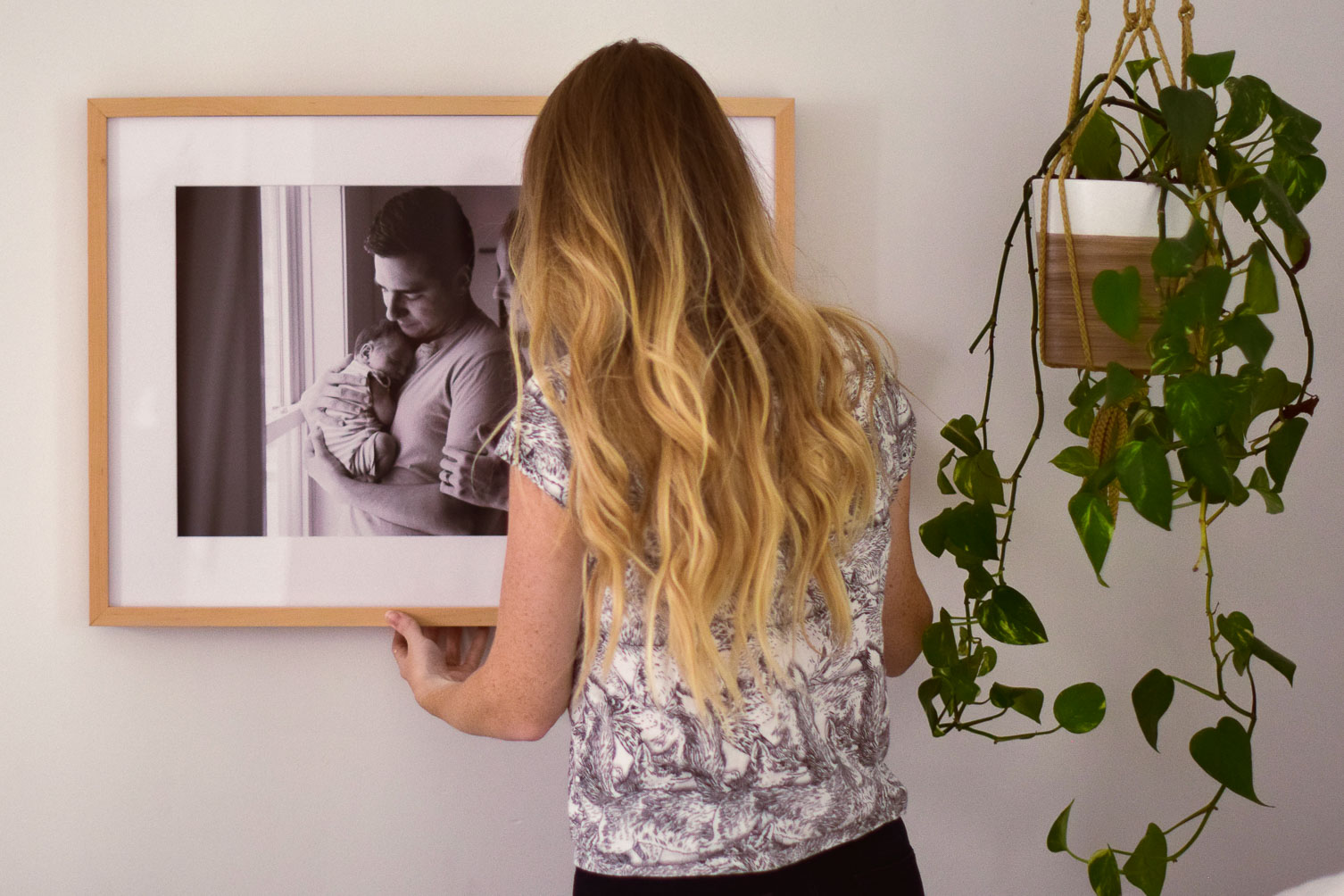sharing how we used the custom design Framebridge services to display our newborn photos on one brass fox