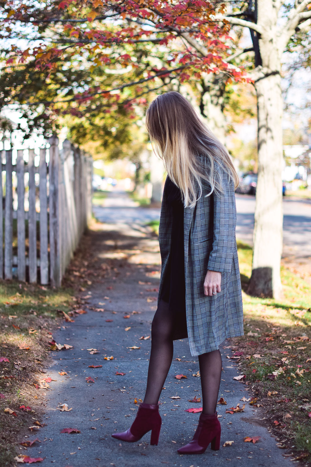 sharing an easy holiday party outfit with this Topshop balloon sleeve dress, checked trench coat, and oxblood booties