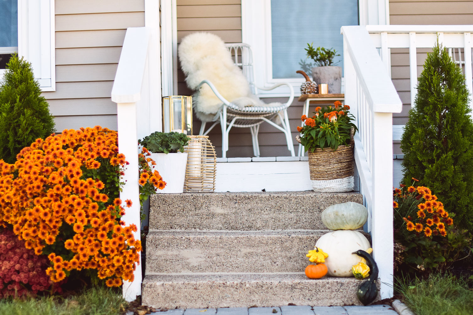 styling a porch with cute and festive outdoor fall decor on a budget