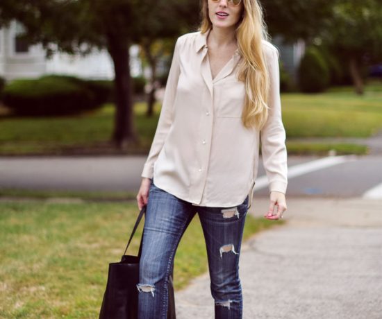 Leslie Musser styling pink fur loafers for fall with distressed skinny jeans, a blush silk top, and black leather tote