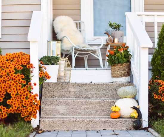 styling a porch with cute and festive outdoor fall decor on a budget
